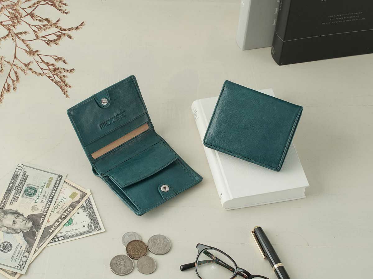 ヴァケッタルクス　二つ折りミニ財布　ターコイズ