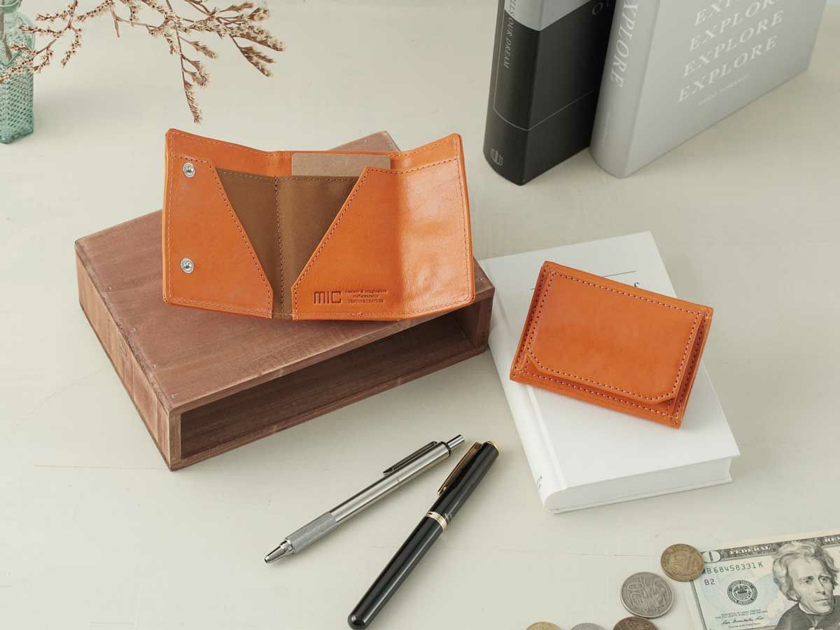 ヴァケッタルクス　三つ折りミニ財布　オレンジ